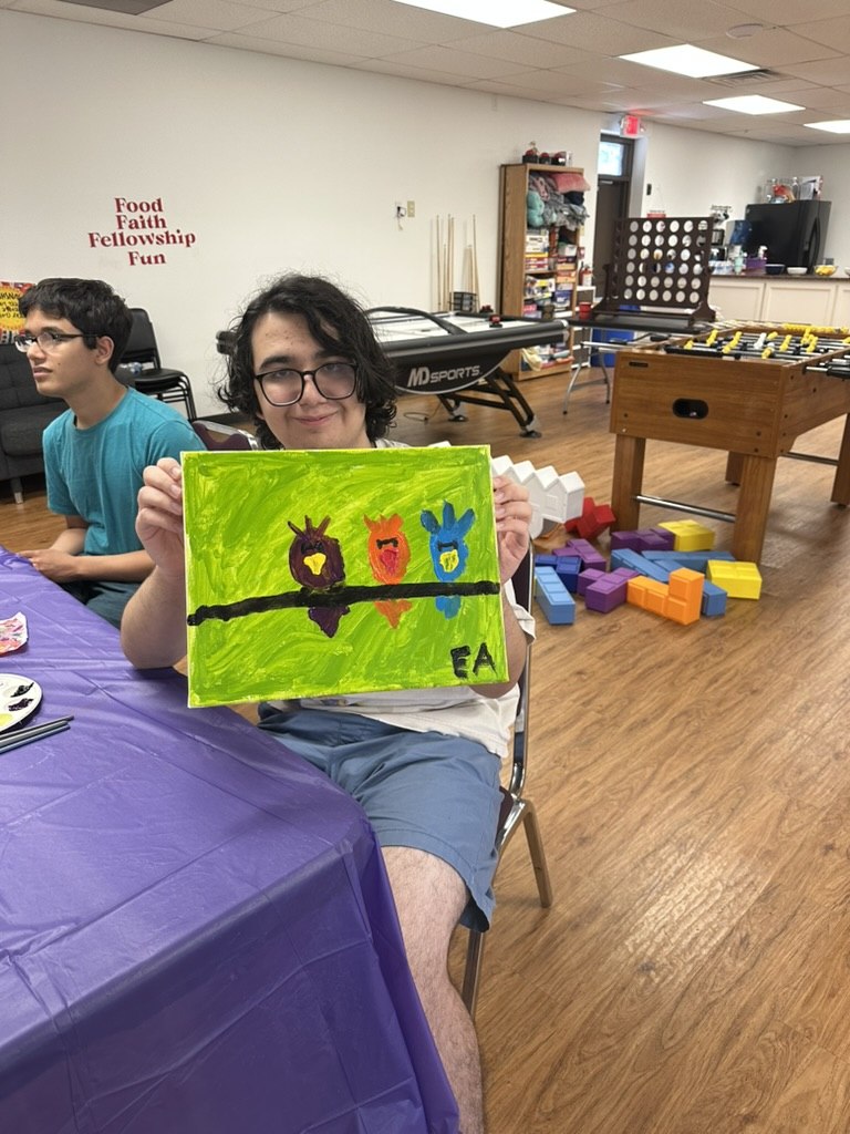 Art Creations participants painting and crafting artwork